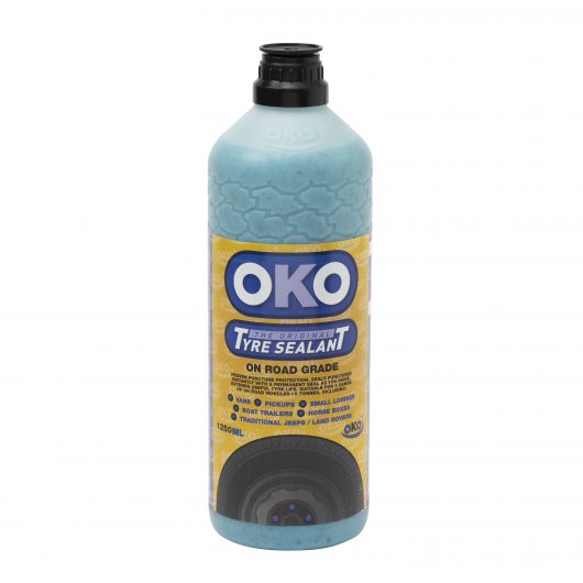 1250ml bottle of OKO LCV puncture protection liquid with black lid and yellow label with tyre to front
