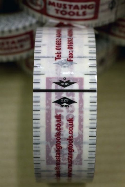Close up of the black measurement marks on the Mustang gauge tape