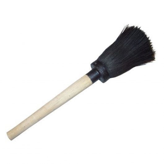 4" Turks head brush with turned wooden handle on a white background