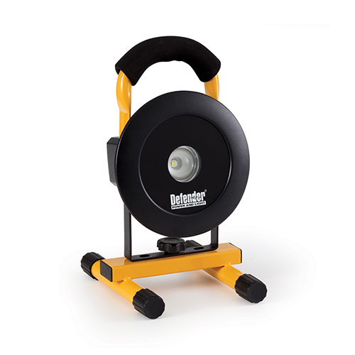 Round Defender LED 400 floorlight with black steel frame mounted onto yellow metal stand